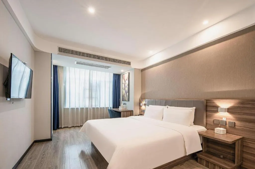 Bed in 7 Days Inn Yingshang Lanxing Building Materials Market