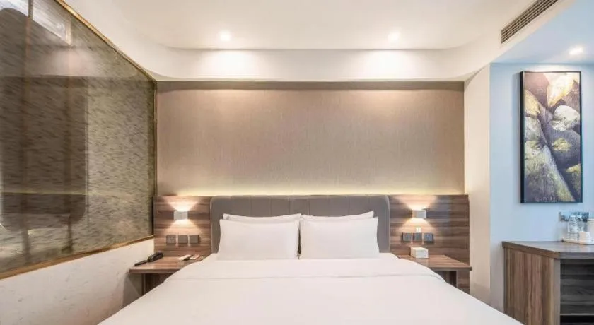 Bed in 7 Days Inn Yingshang Lanxing Building Materials Market