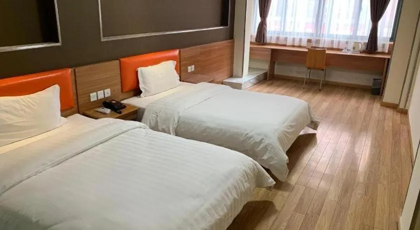 Bed in 7 Days Inn Yingshang Lanxing Building Materials Market