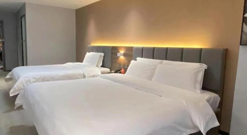 Bed in 7 Days Inn Yingshang Lanxing Building Materials Market