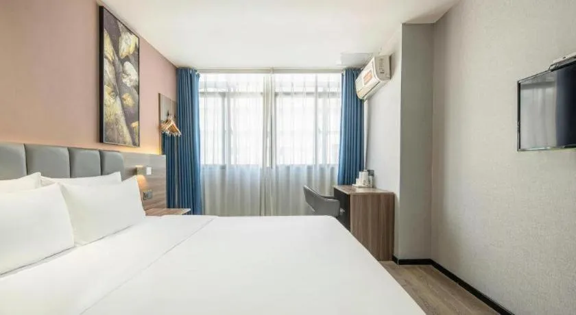 Bed in 7 Days Inn Yingshang Lanxing Building Materials Market