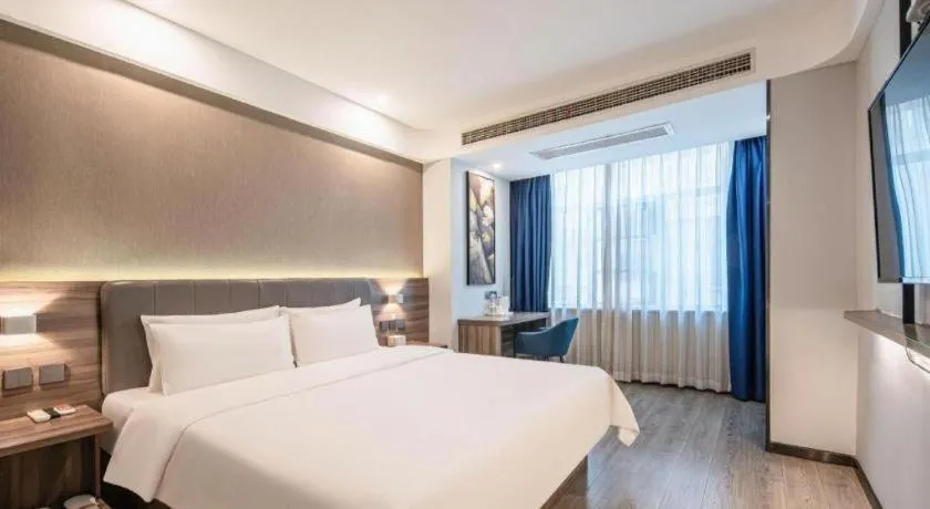 Bed in 7 Days Inn Yingshang Lanxing Building Materials Market