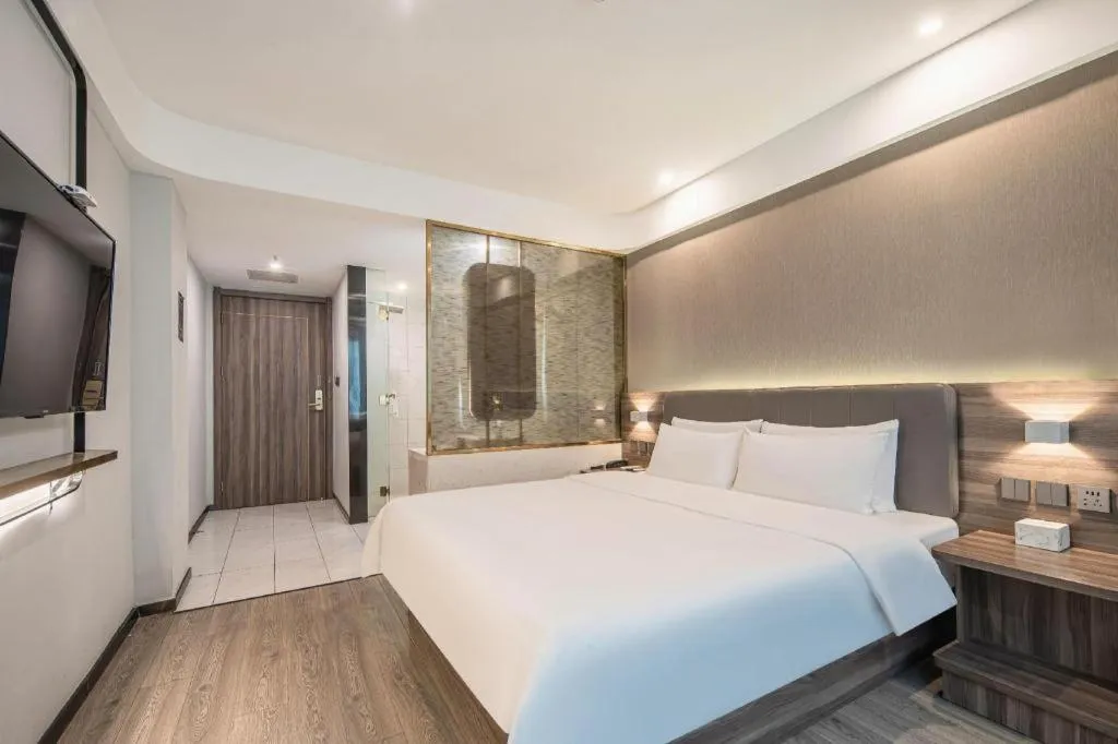 Bed in 7 Days Inn Yingshang Lanxing Building Materials Market