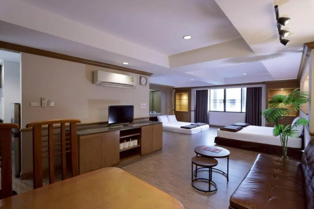 Bed in Alameda Suites Hotel