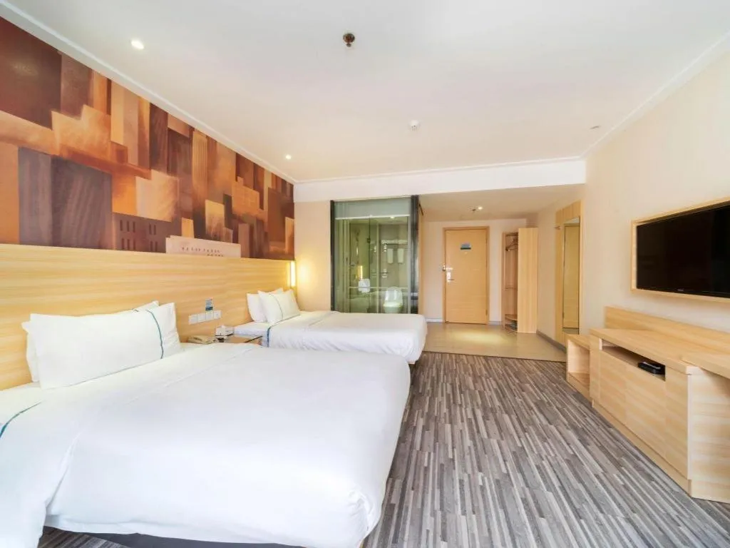 Bed in City Comfort Inn Zhongshan Lihe Square Walmart Branch