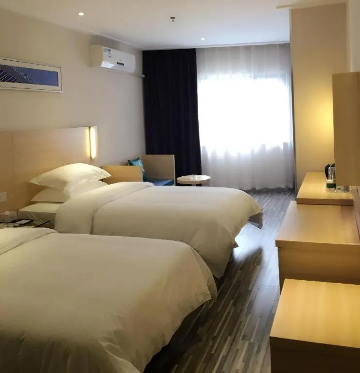 Bed in City Comfort Inn Zhongshan Lihe Square Walmart Branch