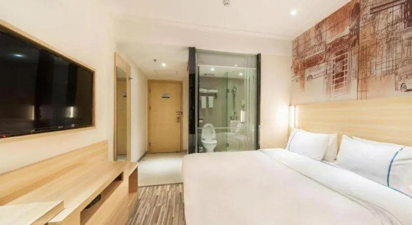 Bed in City Comfort Inn Zhongshan Lihe Square Walmart Branch