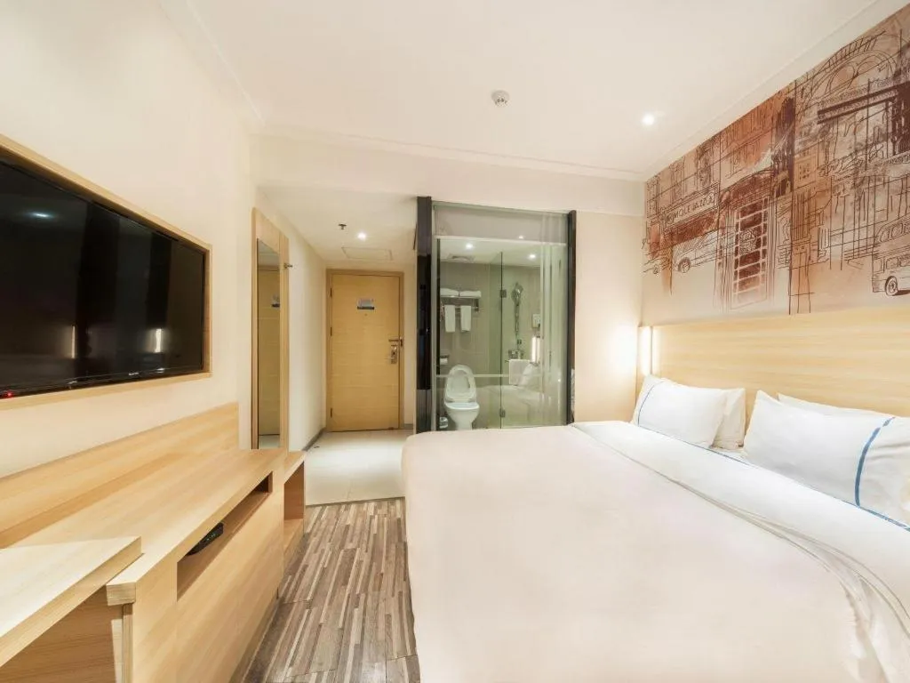 Bed in City Comfort Inn Zhongshan Lihe Square Walmart Branch