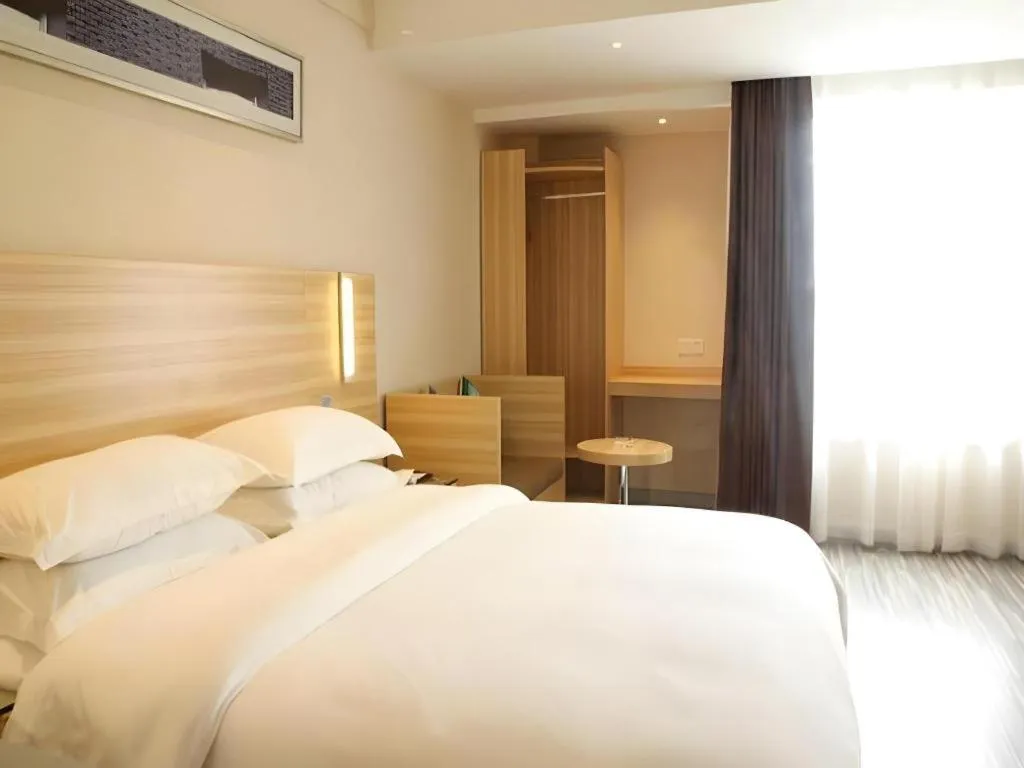 Bed in City Comfort Inn Zhongshan Lihe Square Walmart Branch