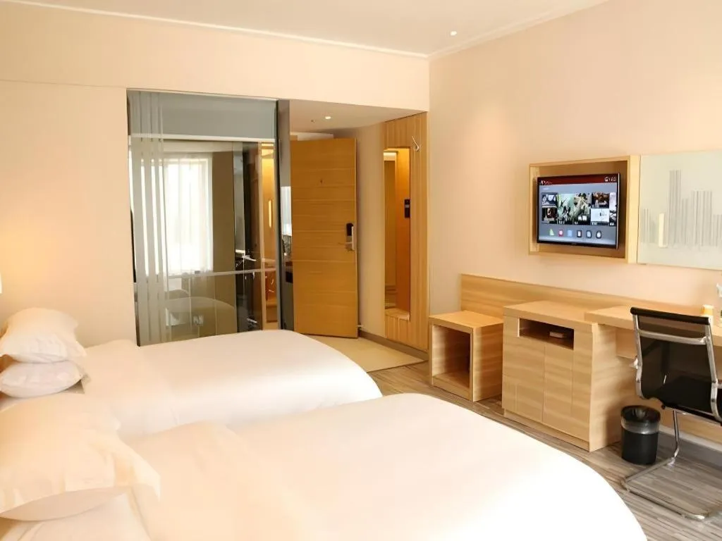 Bed in City Comfort Inn Zhongshan Lihe Square Walmart Branch