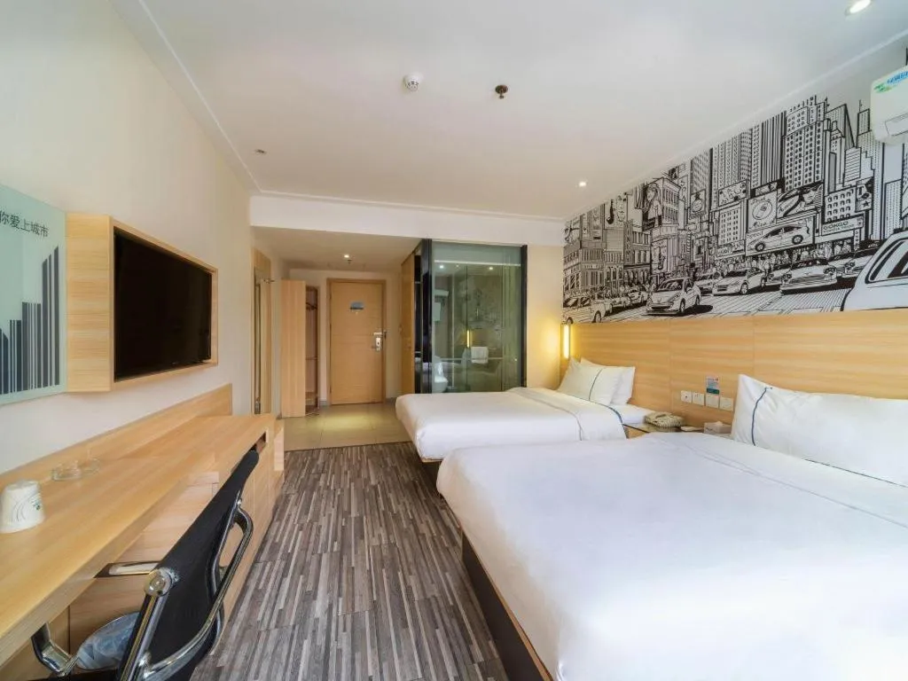 Bed in City Comfort Inn Zhongshan Lihe Square Walmart Branch