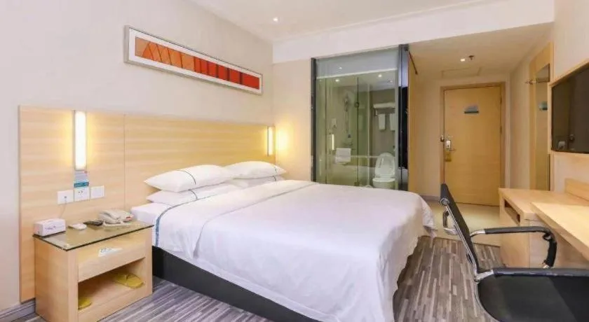 Bed in City Comfort Inn Zhongshan Lihe Square Walmart Branch