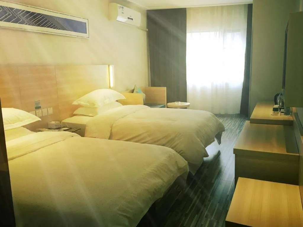 Bed in City Comfort Inn Zhongshan Lihe Square Walmart Branch