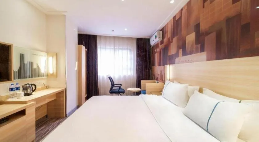 Bed in City Comfort Inn Zhongshan Lihe Square Walmart Branch