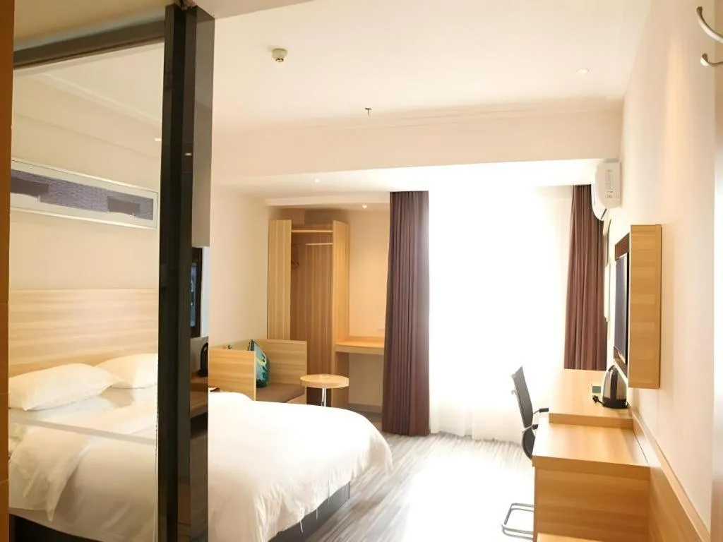 Bed in City Comfort Inn Zhongshan Lihe Square Walmart Branch