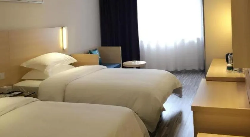 Bed in City Comfort Inn Zhongshan Lihe Square Walmart Branch