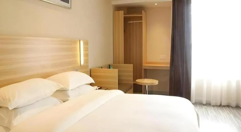 Bed in City Comfort Inn Zhongshan Lihe Square Walmart Branch