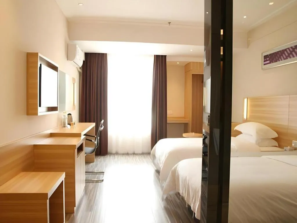 Bed in City Comfort Inn Zhongshan Lihe Square Walmart Branch