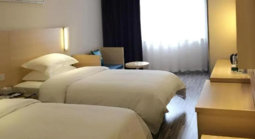 Bed in City Comfort Inn Zhongshan Lihe Square Walmart Branch