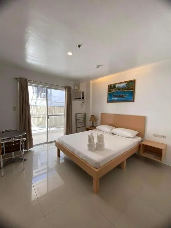 Bed in Jeffrey S Hotel