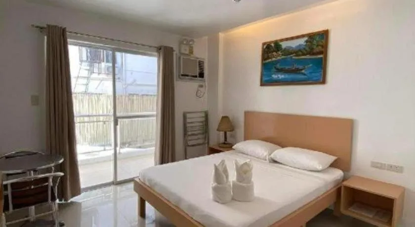 Bed in Jeffrey S Hotel