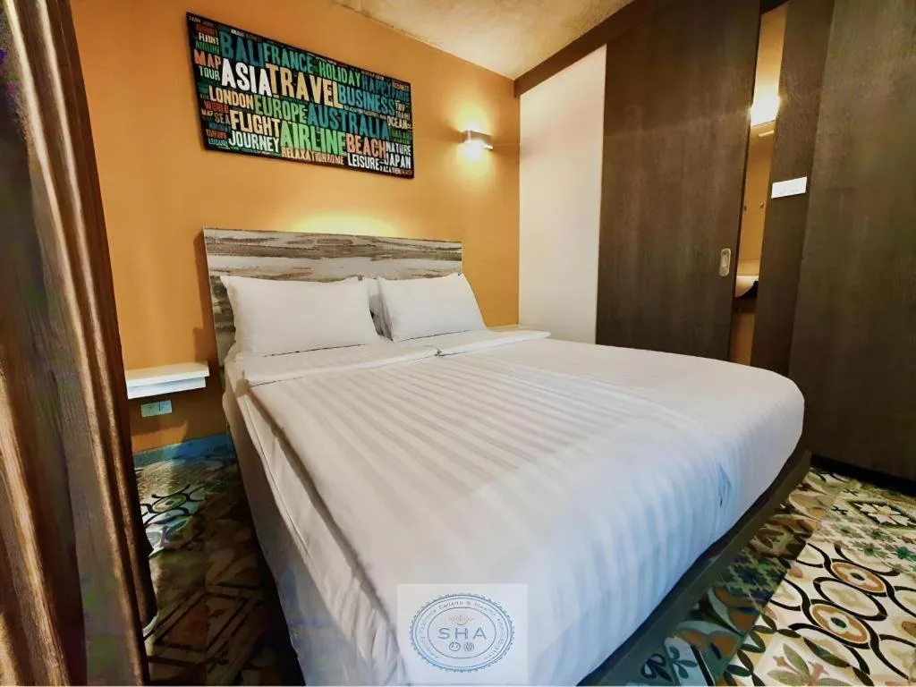 Bed in BB House Mini Suite Hotel