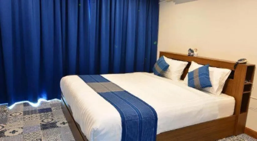 Bed in The Indigo House Phrae