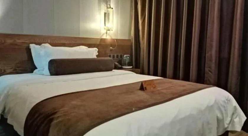 Bed in James Joyce Coffetel Wuxi Taihu Square Subway Station Branch