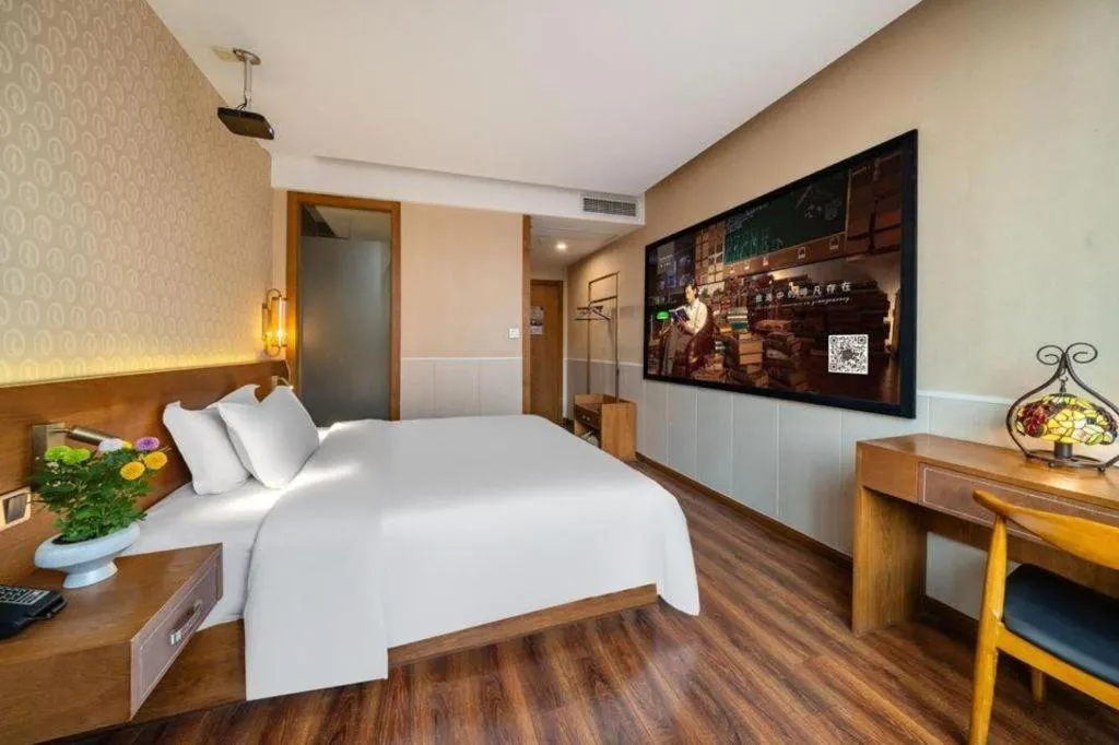 Bed in James Joyce Coffetel Wuxi Taihu Square Subway Station Branch