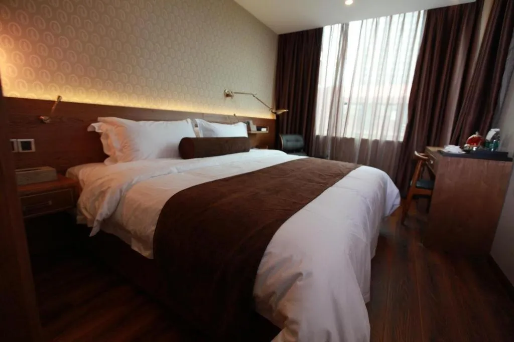 Bed in James Joyce Coffetel Wuxi Taihu Square Subway Station Branch