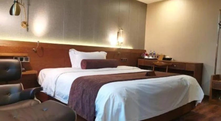 Bed in James Joyce Coffetel Wuxi Taihu Square Subway Station Branch