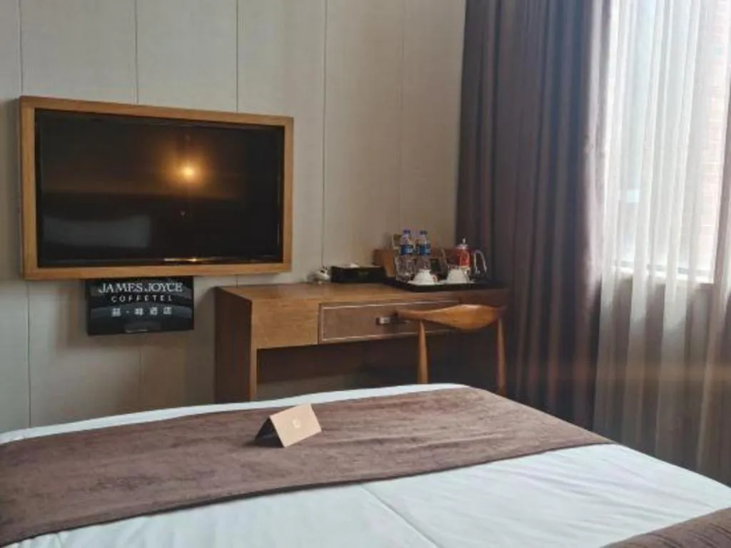 Bed in James Joyce Coffetel Wuxi Taihu Square Subway Station Branch