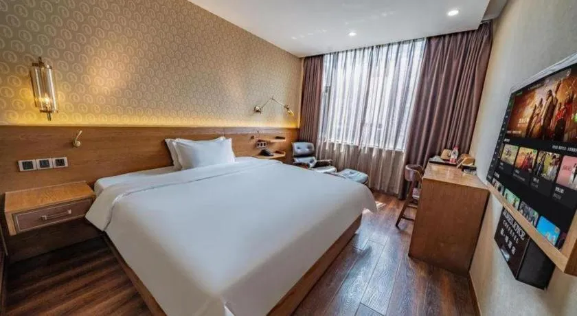 Bed in James Joyce Coffetel Wuxi Taihu Square Subway Station Branch