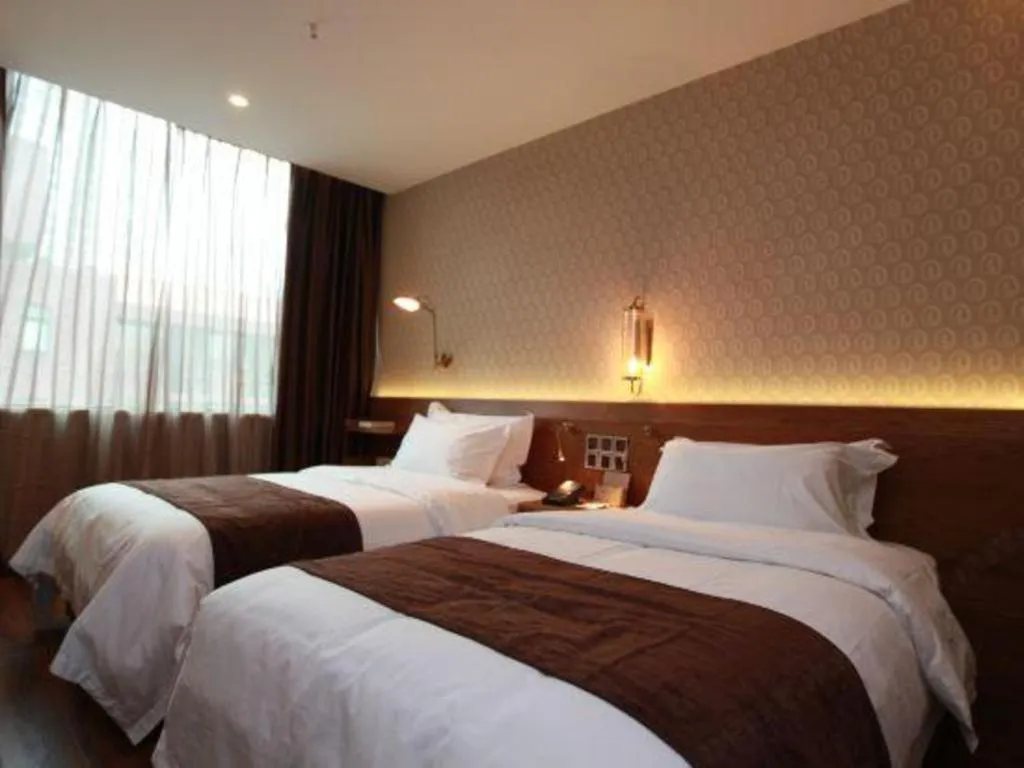 Bed in James Joyce Coffetel Wuxi Taihu Square Subway Station Branch