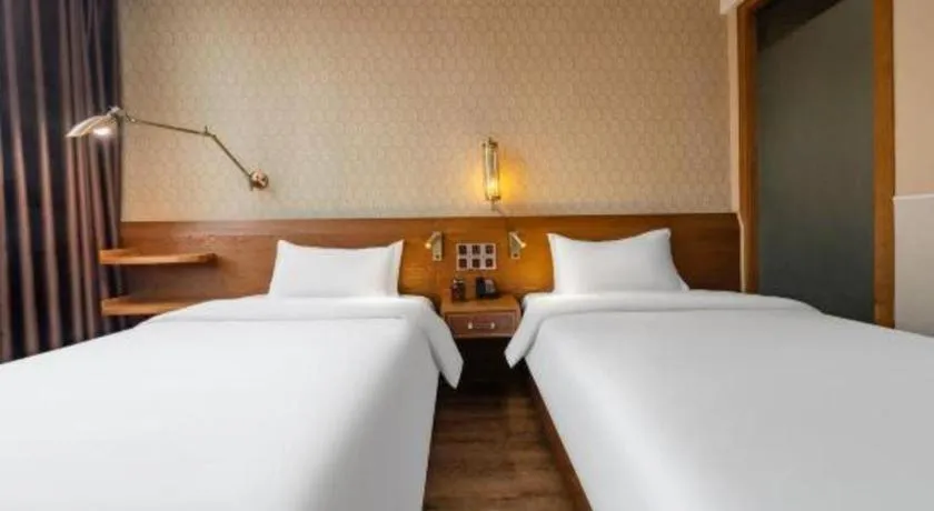 Bed in James Joyce Coffetel Wuxi Taihu Square Subway Station Branch