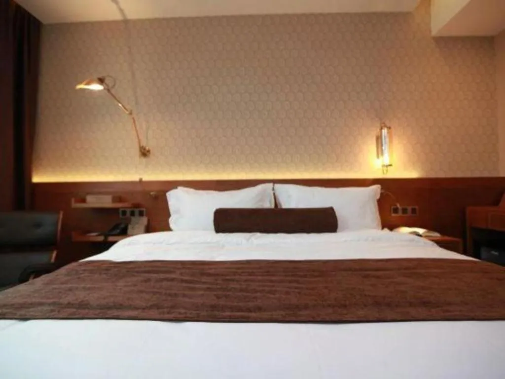 Bed in James Joyce Coffetel Wuxi Taihu Square Subway Station Branch