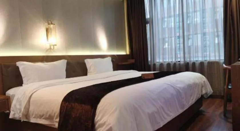 Bed in James Joyce Coffetel Wuxi Taihu Square Subway Station Branch