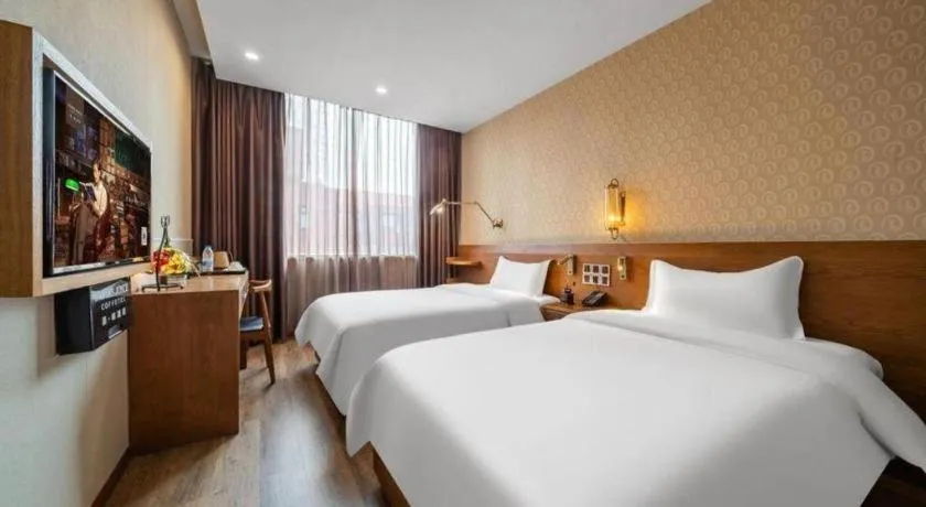 Bed in James Joyce Coffetel Wuxi Taihu Square Subway Station Branch