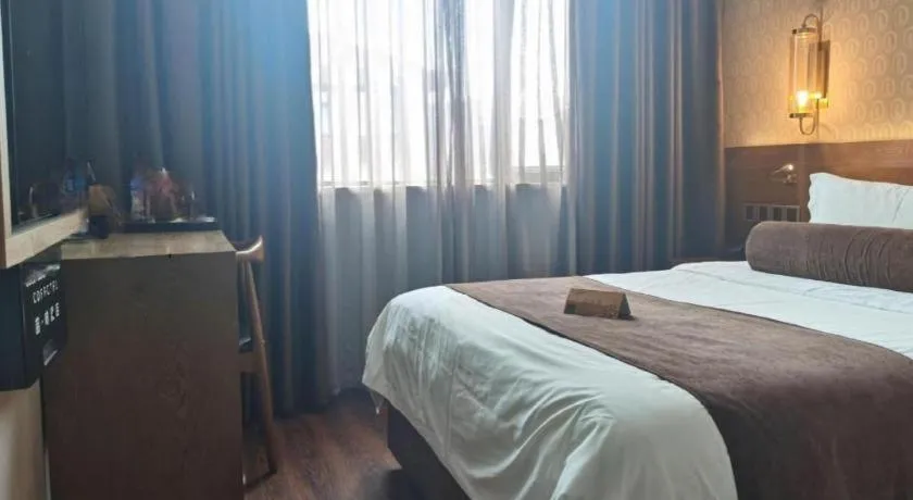 Bed in James Joyce Coffetel Wuxi Taihu Square Subway Station Branch