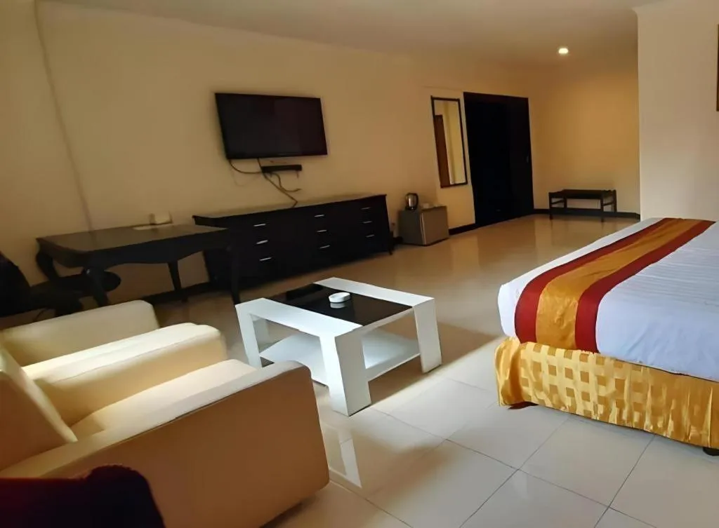 Bed in Grand Hotel Surabaya