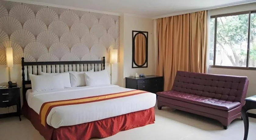 Bed in Grand Hotel Surabaya