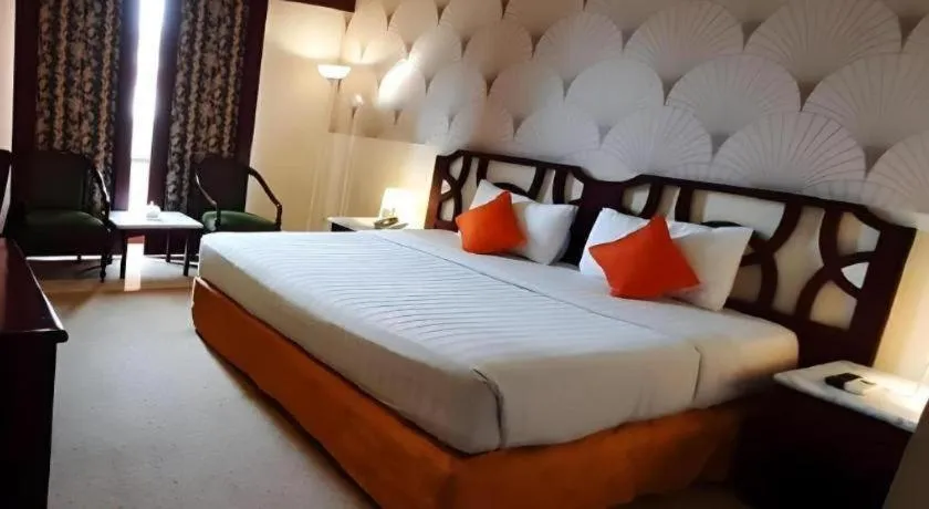 Bed in Grand Hotel Surabaya