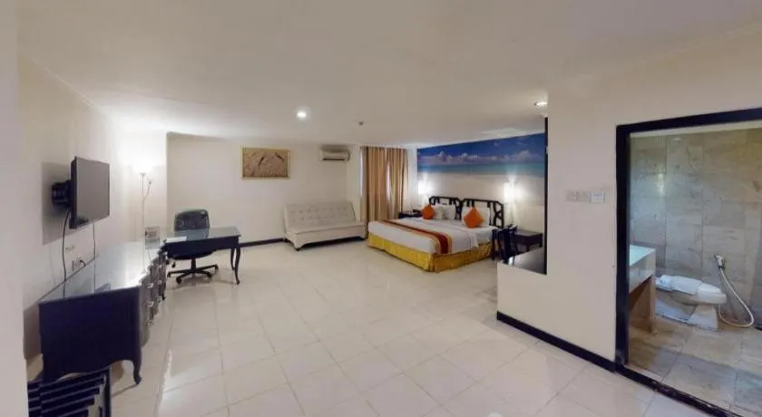 Bed in Grand Hotel Surabaya