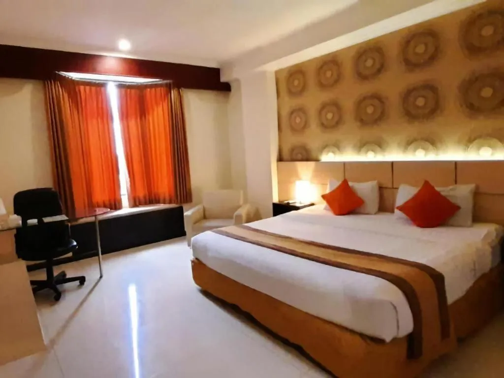 Bed in Grand Hotel Surabaya