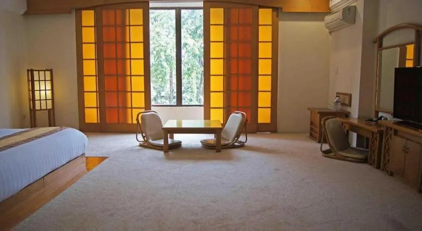 Bed in Grand Hotel Surabaya