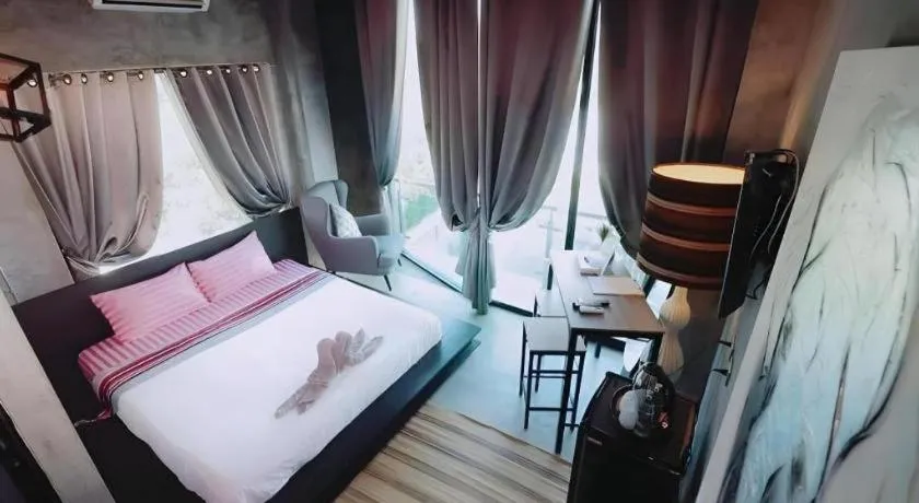 Bed in Theloft boutique nakhonpanom