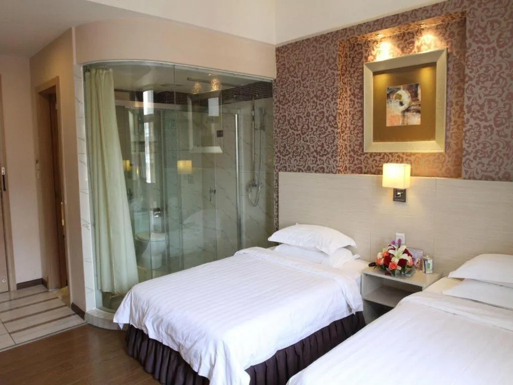 Bed in Pankun Business Hotel