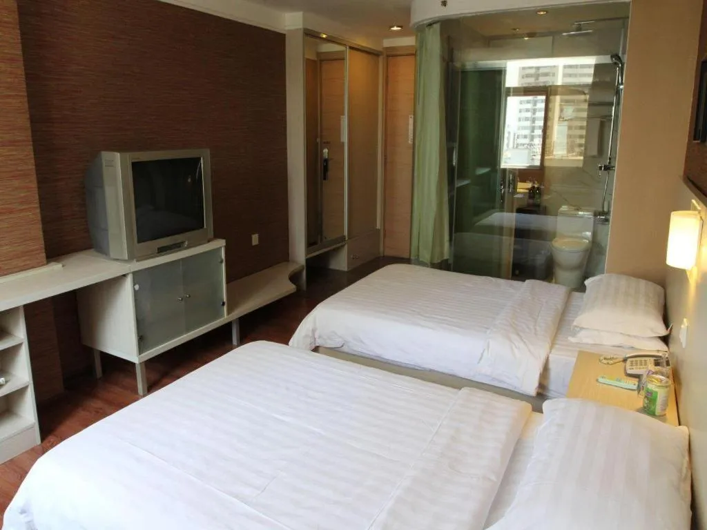 Bed in Pankun Business Hotel