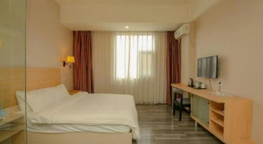 Bed in Pankun Business Hotel