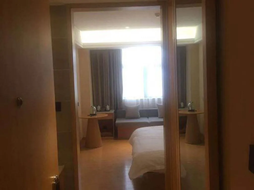 Bed in Pankun Business Hotel